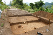 Excavation at the southeastern part of Bukit Gombak where ceramic sherds of the 15th/16th century were discovered under the street level of a modern road.