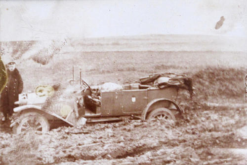 A German car in sludge on a muddy street