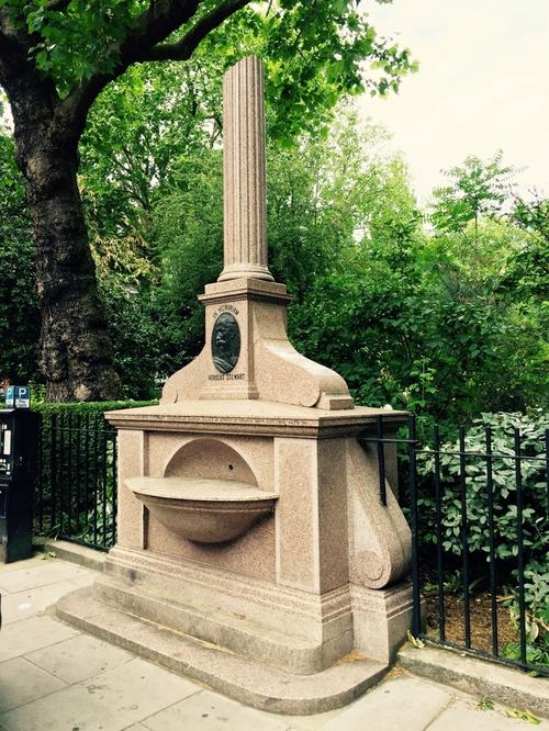Joseph Whitehead (drinking fountain) and Sir Joseph Edgar Boehm (medallion), Herbert Stewart Memorial, Hans Place, London (1887)