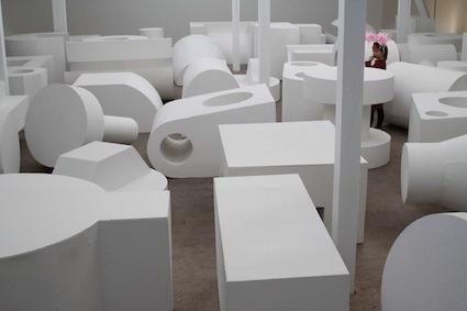 ABSALON: Disposition, 1990, installation view, KW Institute for Contemporary Art, Berlin 2010, wood, cardboard, white dispersion paint, 6 flourescent tubes, 40 elements, approx. 140 x 928 x 1028 cm (Collection FRAC Languedoc-Roussillon).